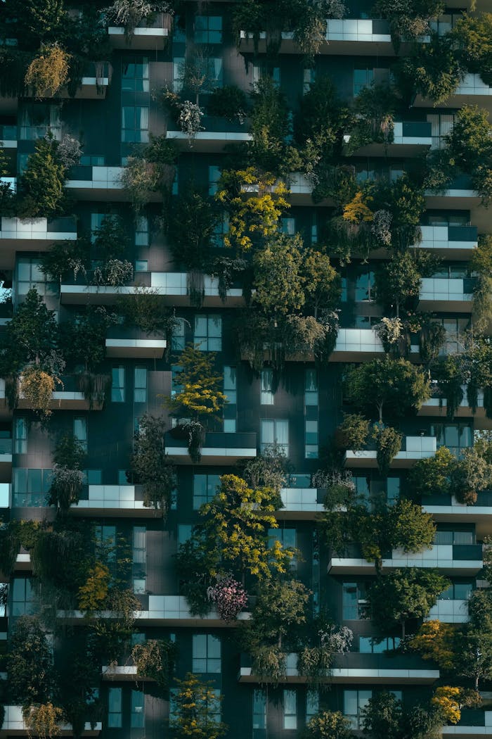 Facade of a contemporary building with lush greenery in Milan's Bosco Verticale.